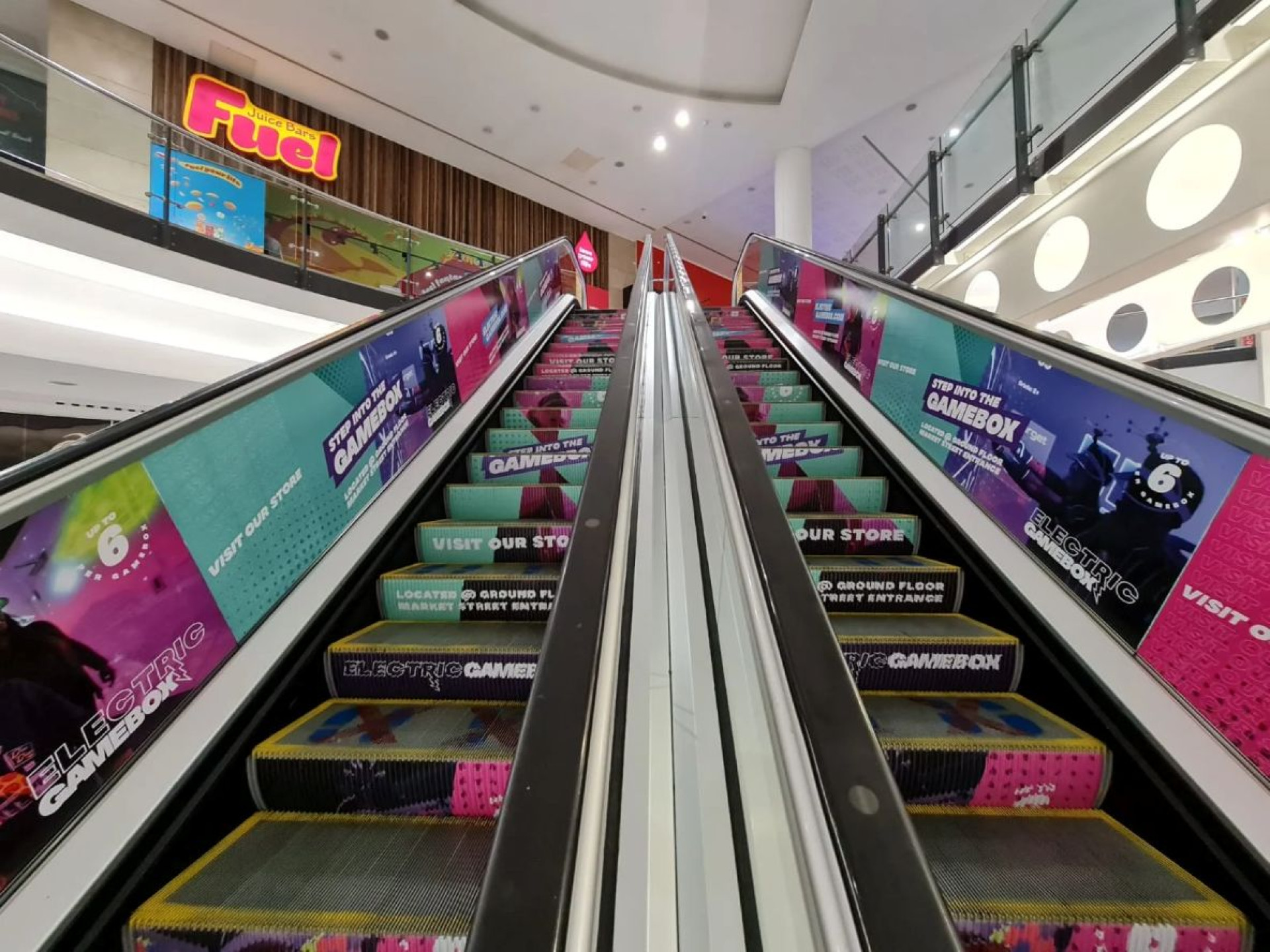 Image of escalator branding